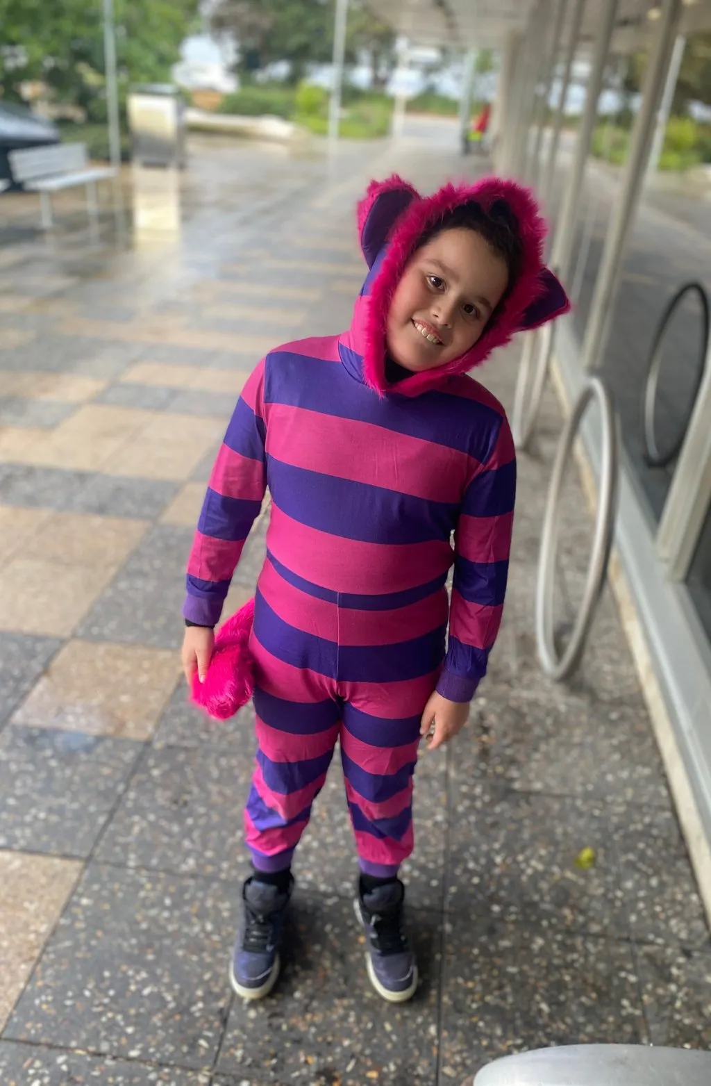 Parent holding a Koluwin book